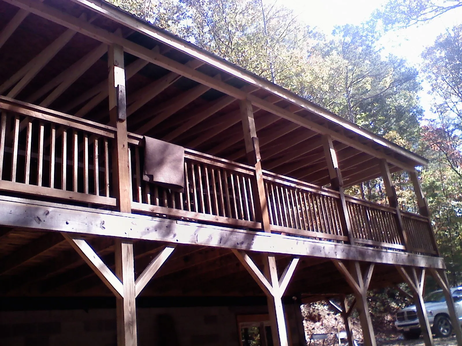 Timber framing under a new elevated porch and deck — Roof Leak Repair in Hedrick by Roofing Brothers